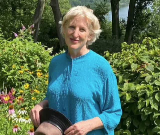 Ellen Bernstein standing in her garden