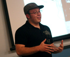 student presenting his Div III work
