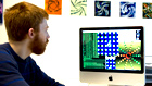 Hampshire College student with computer