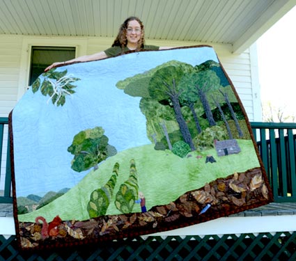 Emily Horne 07F with a quilt made as part of her division III work