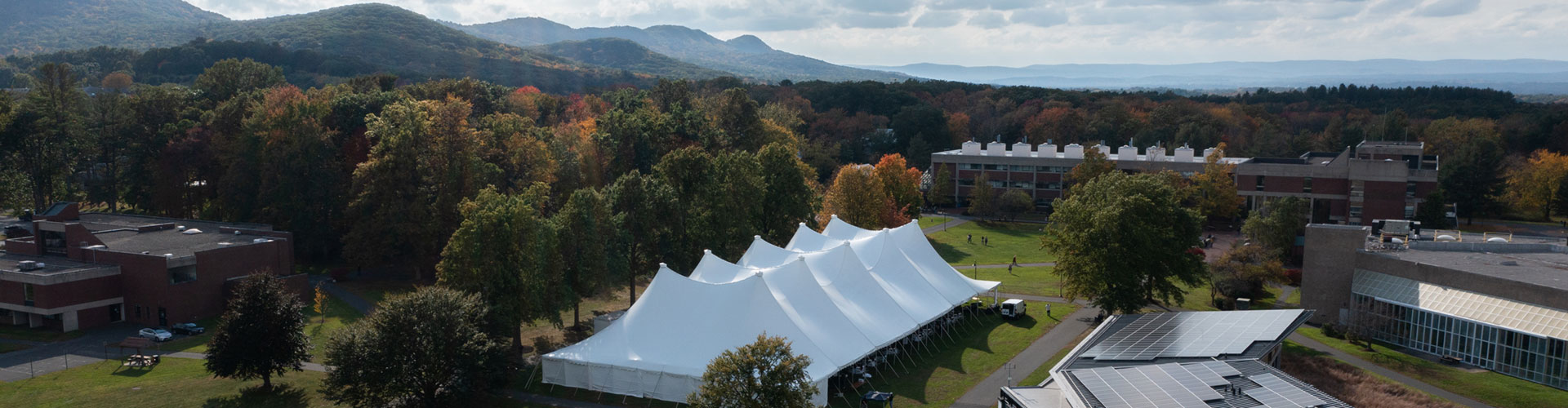 Aerial view of campus with giant white tent