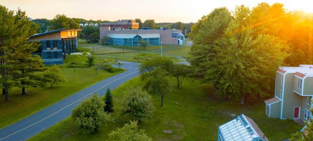 Hampshire College campus seen from above at sunset