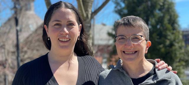 Casey Zella Andrews and Rachel Conrad smile at camera