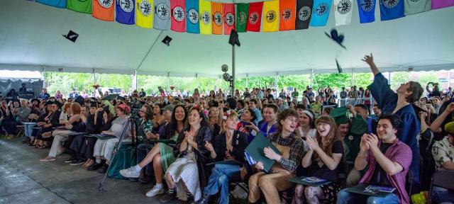 Commencement ceremony with graduates celebrating