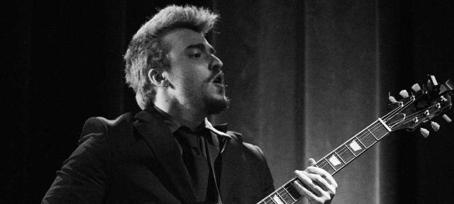 Levi Ebnit playing guitar