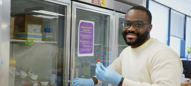 Student Edwin working in the Hampshire College lab.