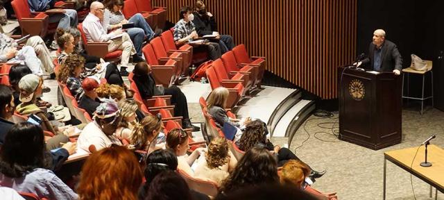 Jeff Sharlet addressing an audience in Franklin Patterson Hall