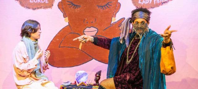 Karim Barrett 23F performing in their play, Heaven's Door