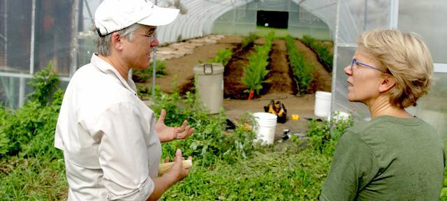 President Mim Nelson being Shown one of Hampshire's Greenhouses