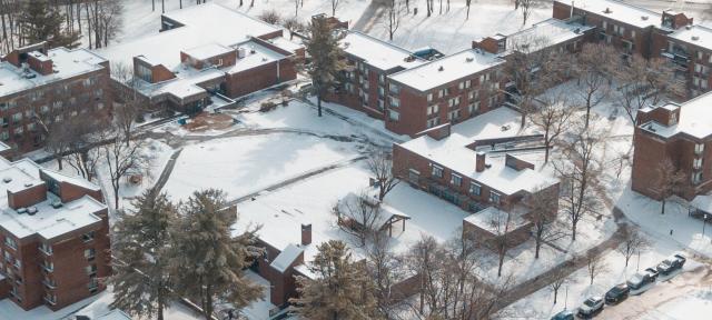 Campus buildings covered with snow as seen from above