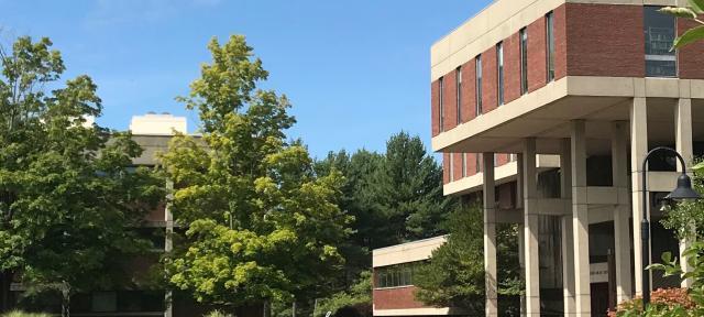 Cole Science Center and Johnson Library against a blue sky