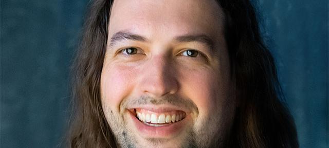 A headshot of Joe Fenstermaker