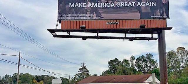 MAKE AMERICA GREAT AGAIN. Photo of Bloody Sunday in 1965 Alabama by Spider Martin. A political-art billboard by Wyatt Gallery and For Freedoms