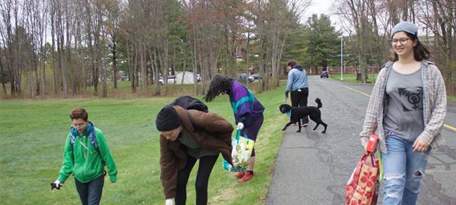 Students picking up litter on the Hampshire College campus