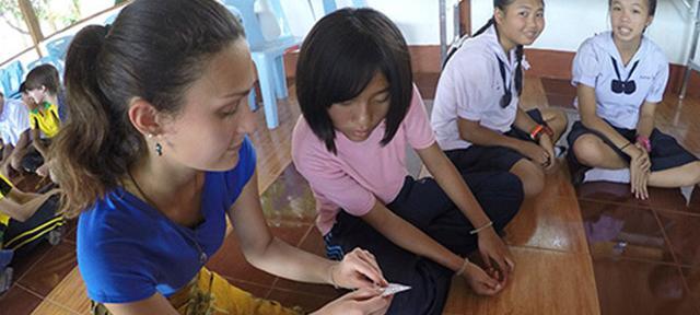 Megan Dobro and students teach sexual education course in Thailand