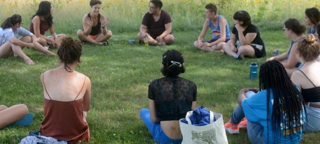 summer-course students meet outdoors