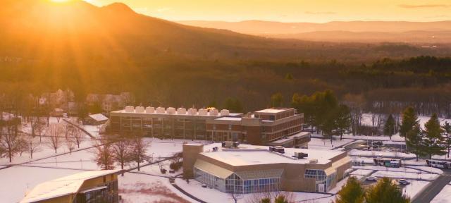 aerial view of campus with snowy sunset