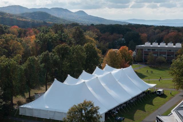 Aerial view of campus with giant white tent