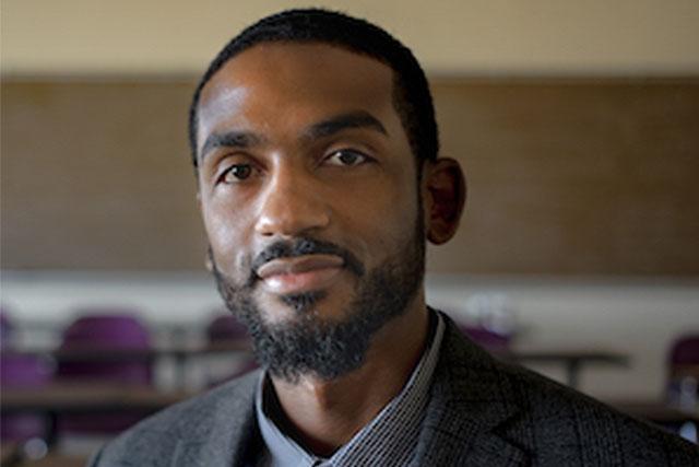 A headshot of Orisanmi Burton