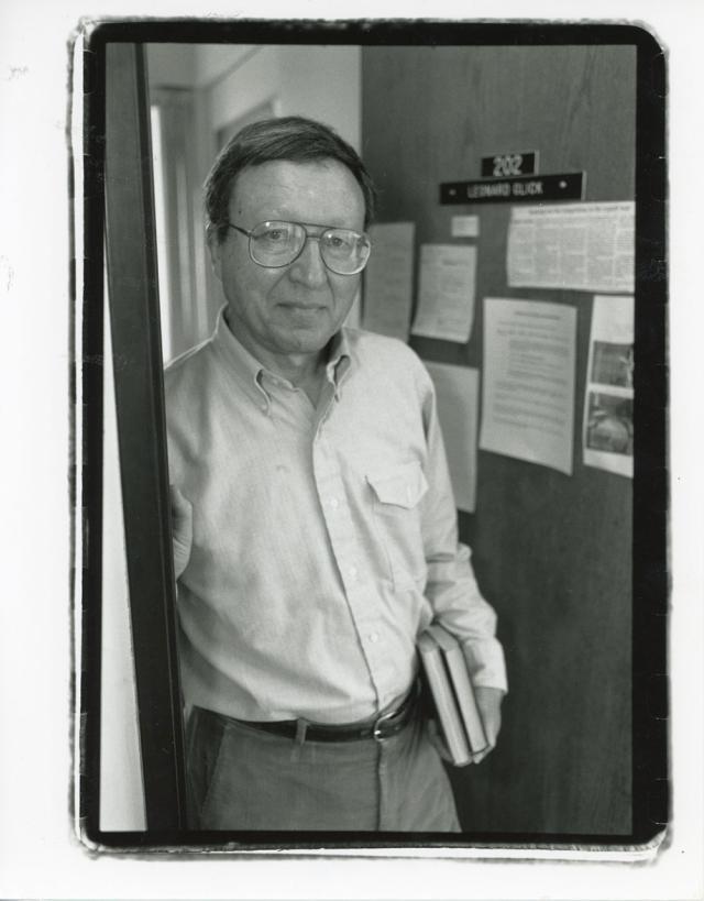 Leonard Glick, standing in his office doorway