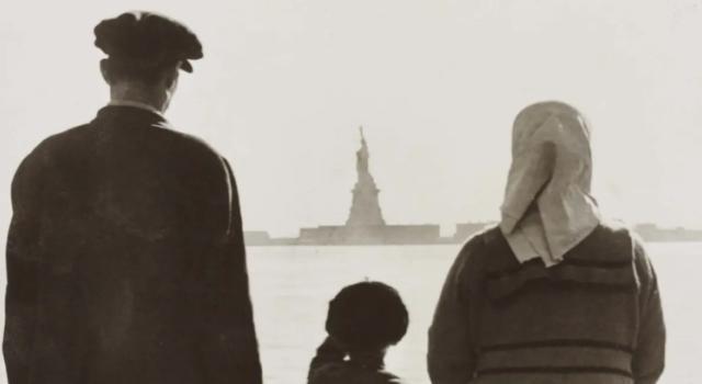 immigrants facing the Statue of Liberty from afar 