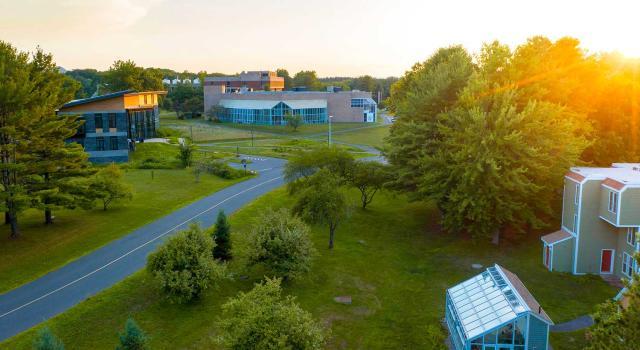 Hampshire College campus seen from above at sunset