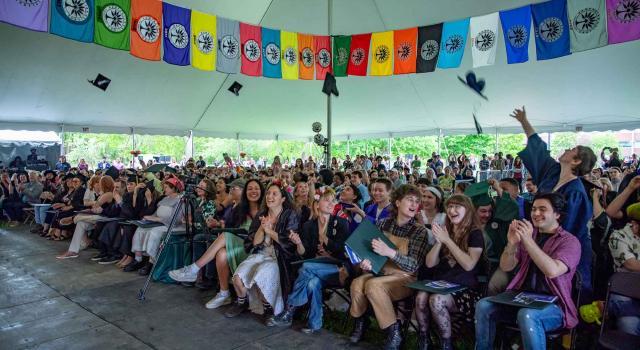 Commencement ceremony with graduates celebrating