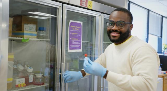 Student Edwin working in the Hampshire College lab.
