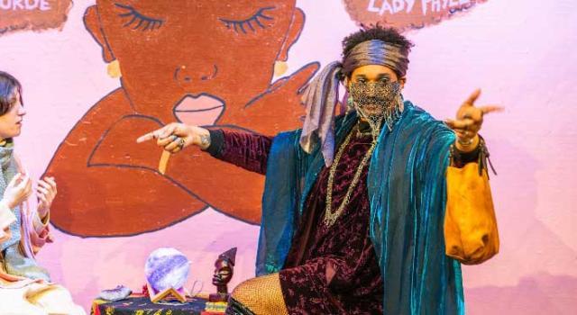Karim Barrett 23F performing in their play, Heaven's Door