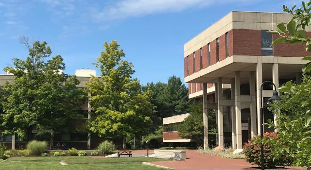 Cole Science Center and Johnson Library against a blue sky