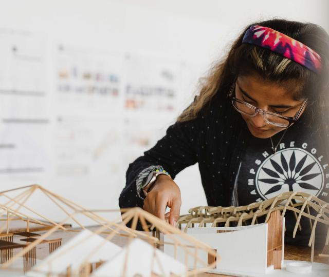 Student working on building model.