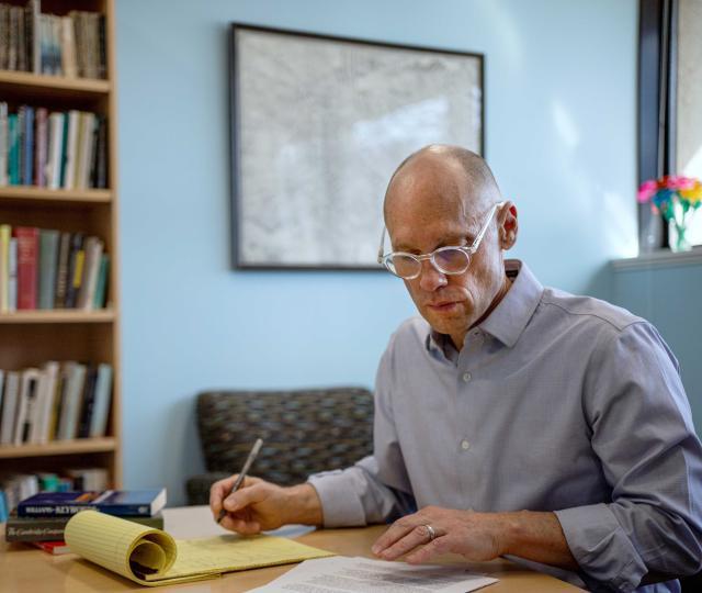 Christoph Cox at Desk