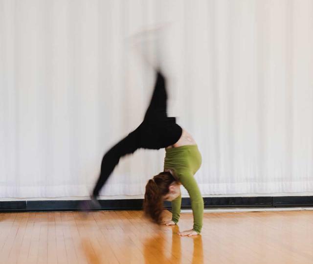Student dancing in classroom.