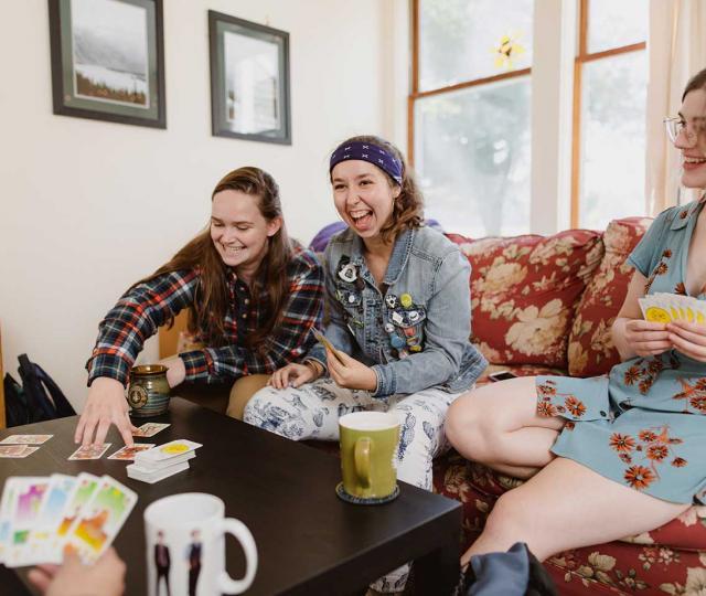 Students playing cards in Hampshire housing.