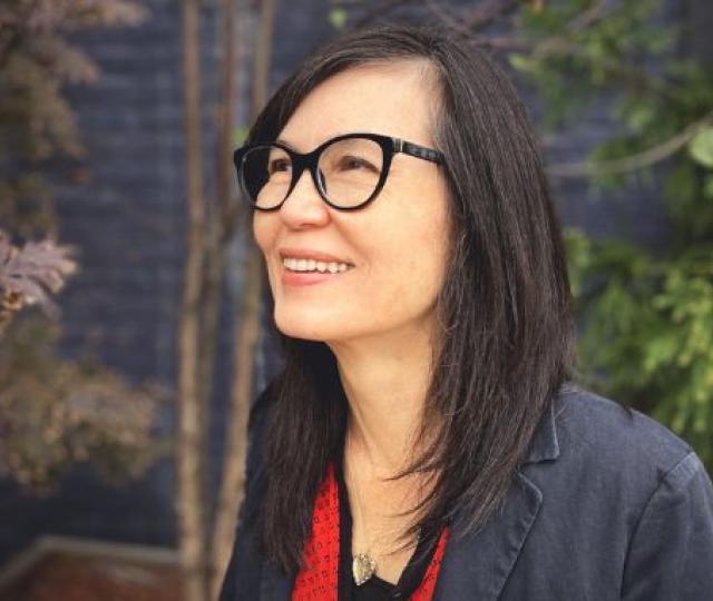Tastes Like War: A Memoir book cover next to a photo of author Grace M. Cho.