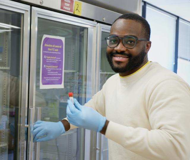Student Edwin working in the Hampshire College lab.