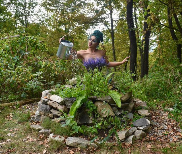Forrest Fleur watering a garden