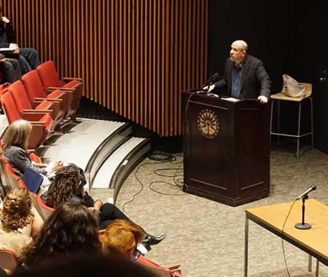 Jeff Sharlet addressing an audience in Franklin Patterson Hall