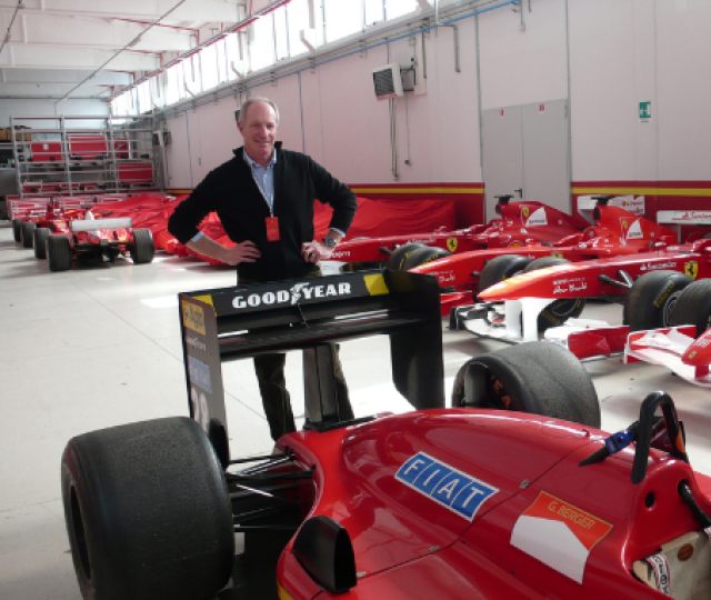 Left: Photo of David Wiener with Formula 1 cars. Right: Cover of ACCIDENTAL MADNESS