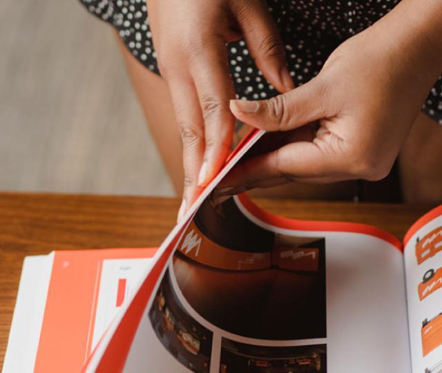 a hand turning a book page