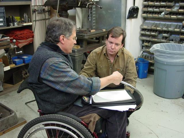 A man in a wheelchair and Colin Twitchell