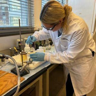 Anneka filtering her samples