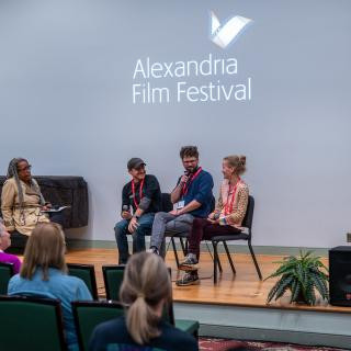Zach Laliberte, Zan Gillies, and Lysandra Petersson being interviewed at the Alexandria Film Festival, November 2025.