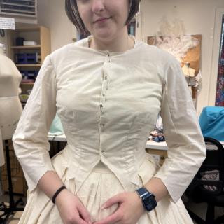 Lila in the mockup of her transformation gown.