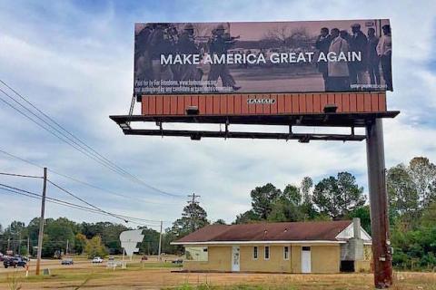 MAKE AMERICA GREAT AGAIN. Photo of Bloody Sunday in 1965 Alabama by Spider Martin. A political-art billboard by Wyatt Gallery and For Freedoms