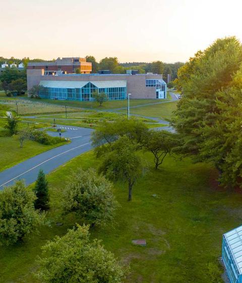 Hampshire College campus seen from above at sunset