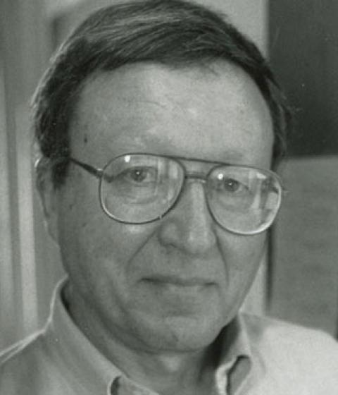 Leonard Glick standing in the doorway of his office