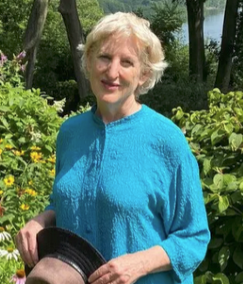 Ellen Bernstein standing in her garden