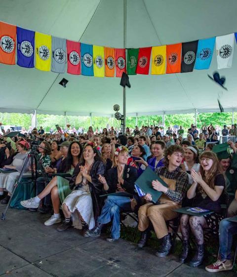 Commencement ceremony with graduates celebrating