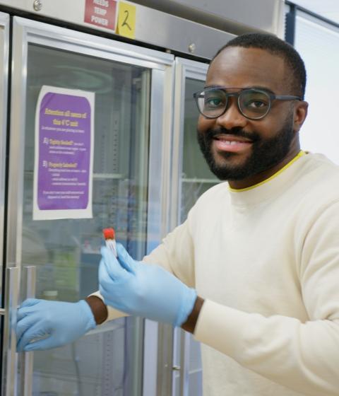 Student Edwin working in the Hampshire College lab.